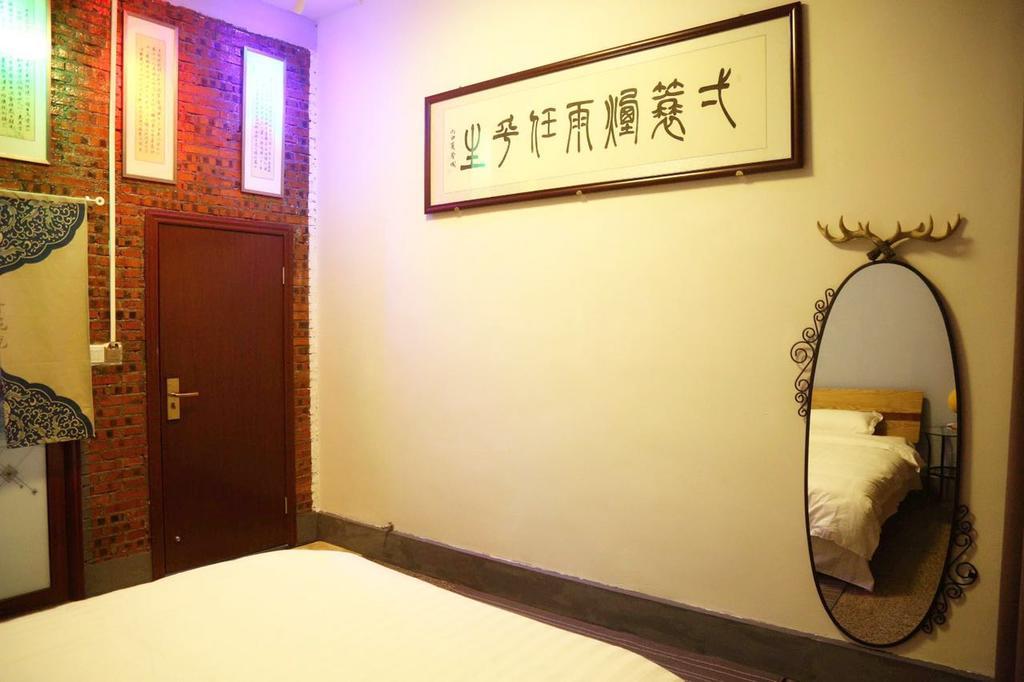 Zhaohuaxishi Youth Hostel Cantón Exterior foto